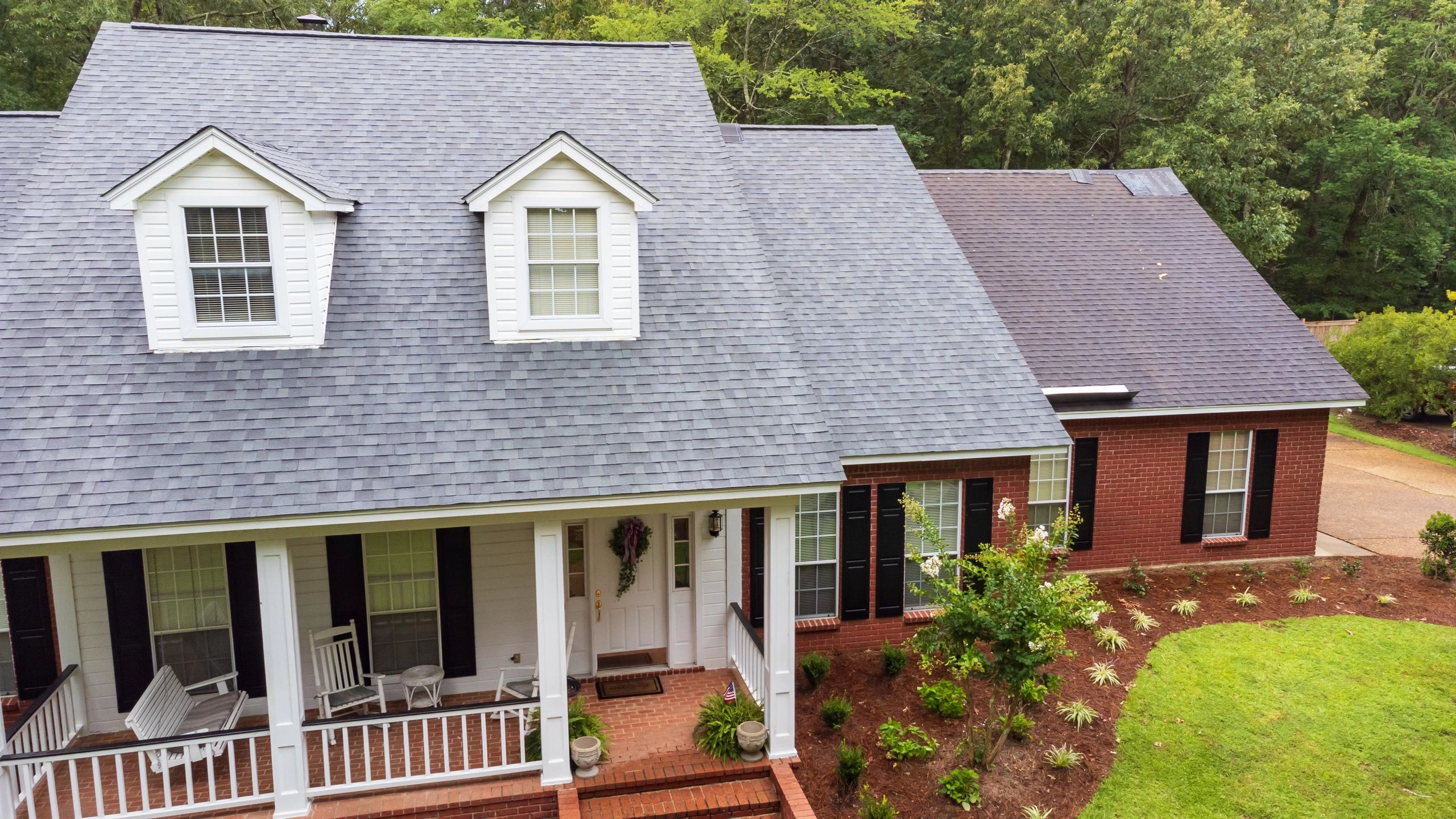 Before: Aging Asphalt Shingles